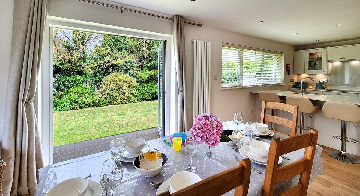 Set outside into the garden through the French windows.