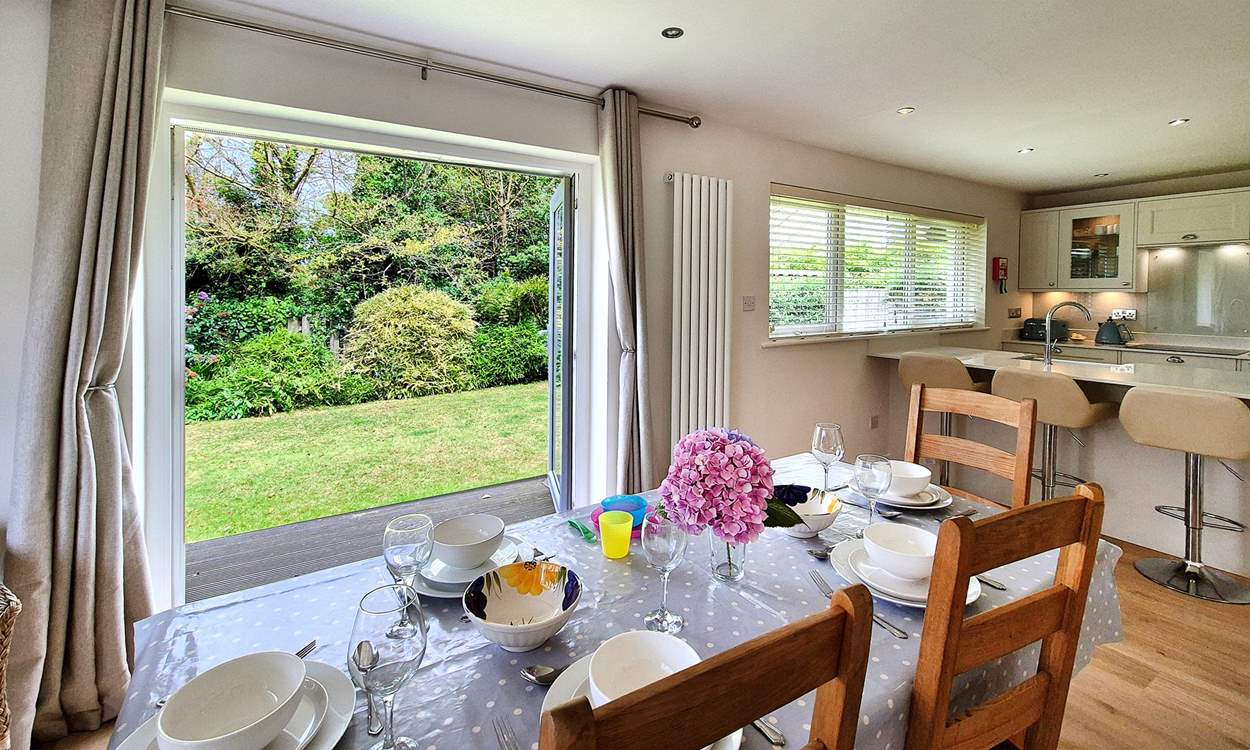 Set outside into the garden through the French windows.