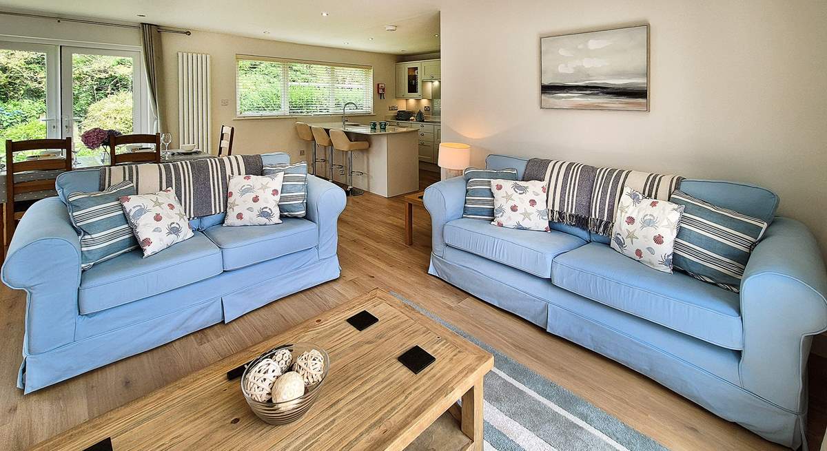 Sit on the comfy sofas and catch a movie on the Smart TV.