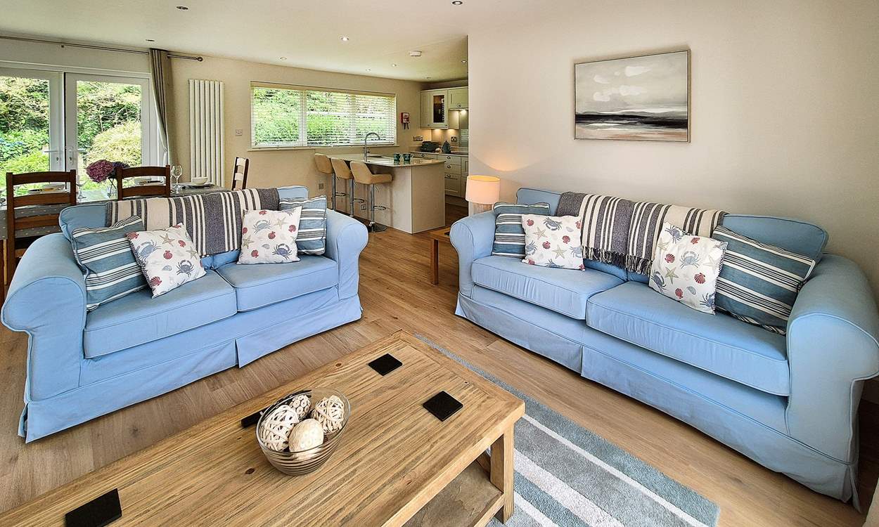 Sit on the comfy sofas and catch a movie on the Smart TV.