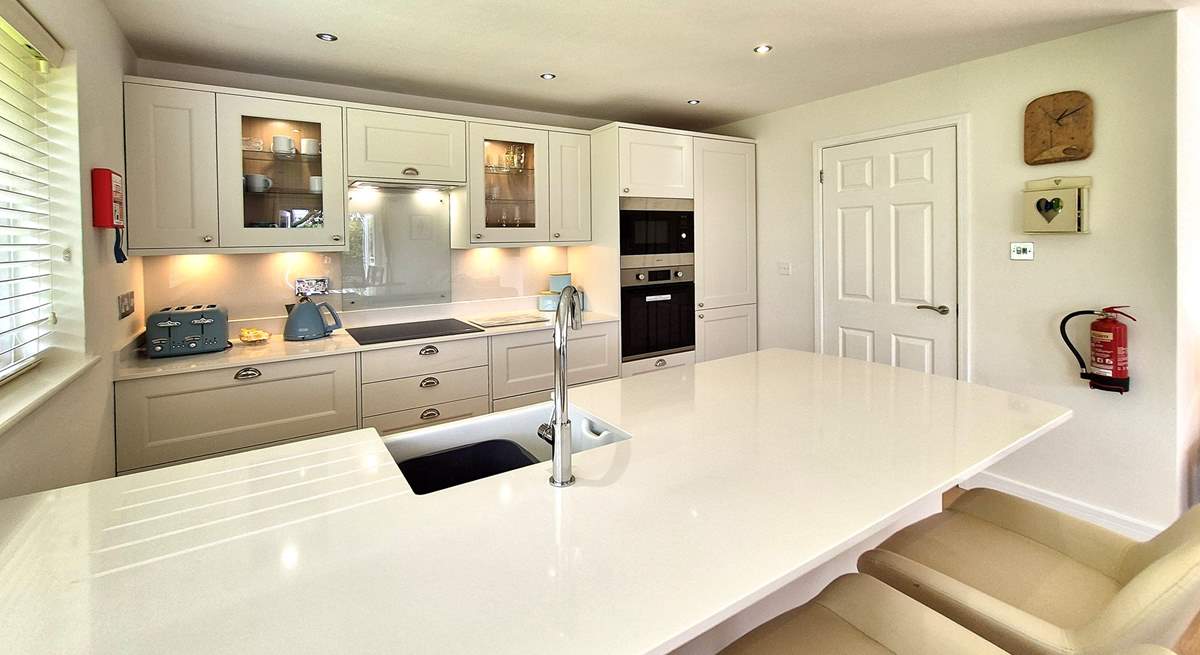 The stylish kitchen has all the equipment you will need to create a culinary masterpiece. 