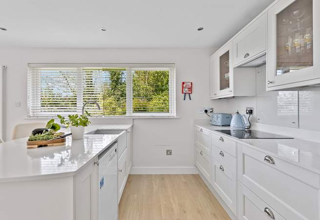 The stylish kitchen has all the equipment you will need to create a culinary masterpiece. 