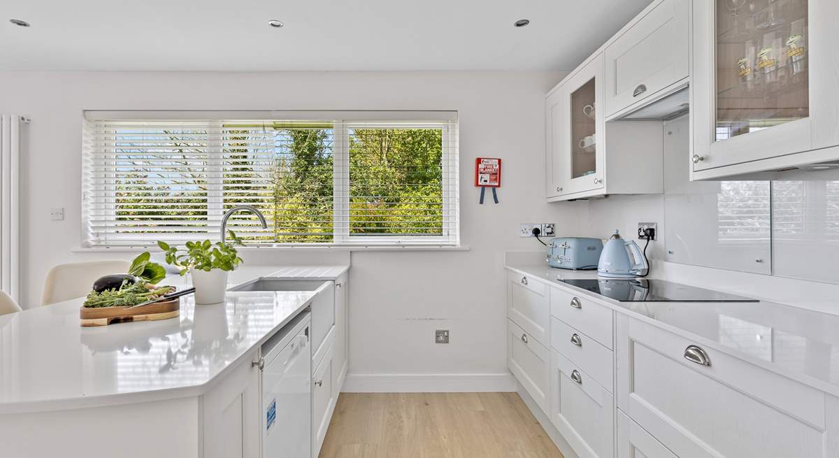 The stylish kitchen has all the equipment you will need to create a culinary masterpiece. 