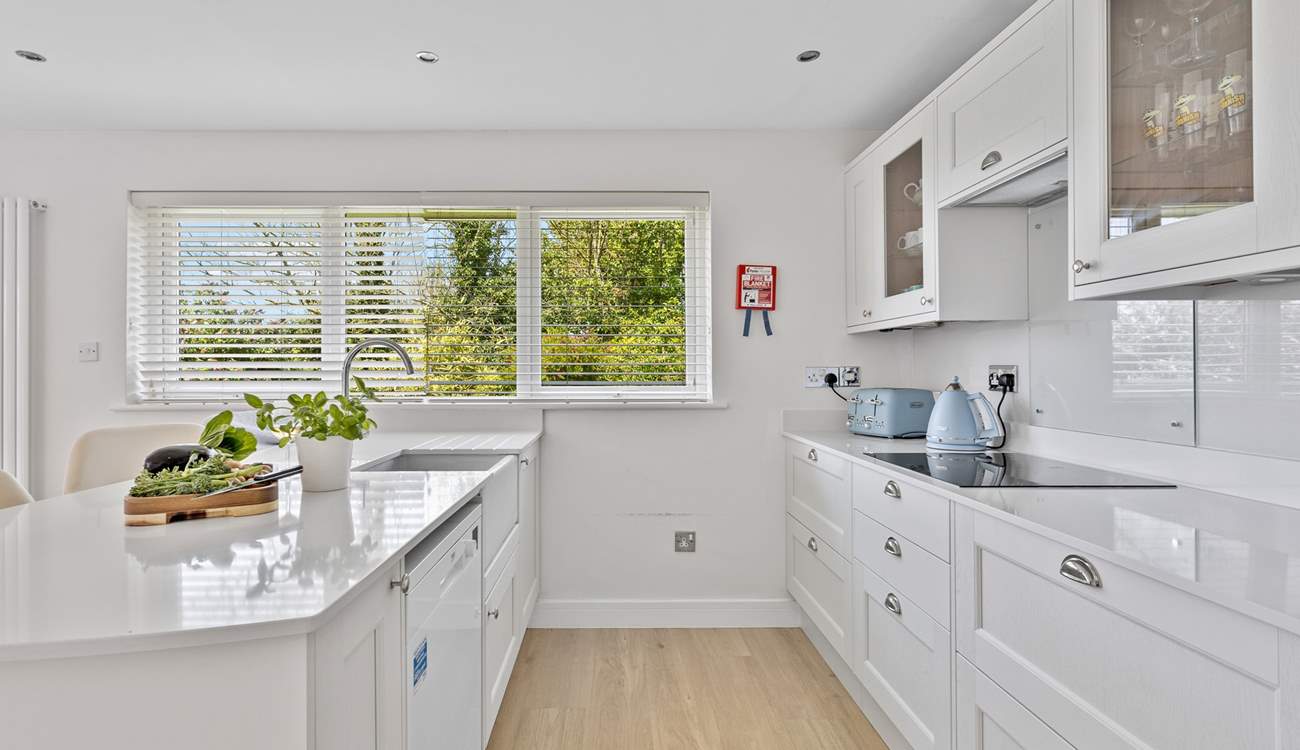 The stylish kitchen has all the equipment you will need to create a culinary masterpiece. 