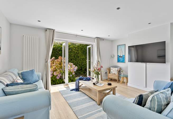 Sit on the comfy sofas and catch a movie on the Smart TV.