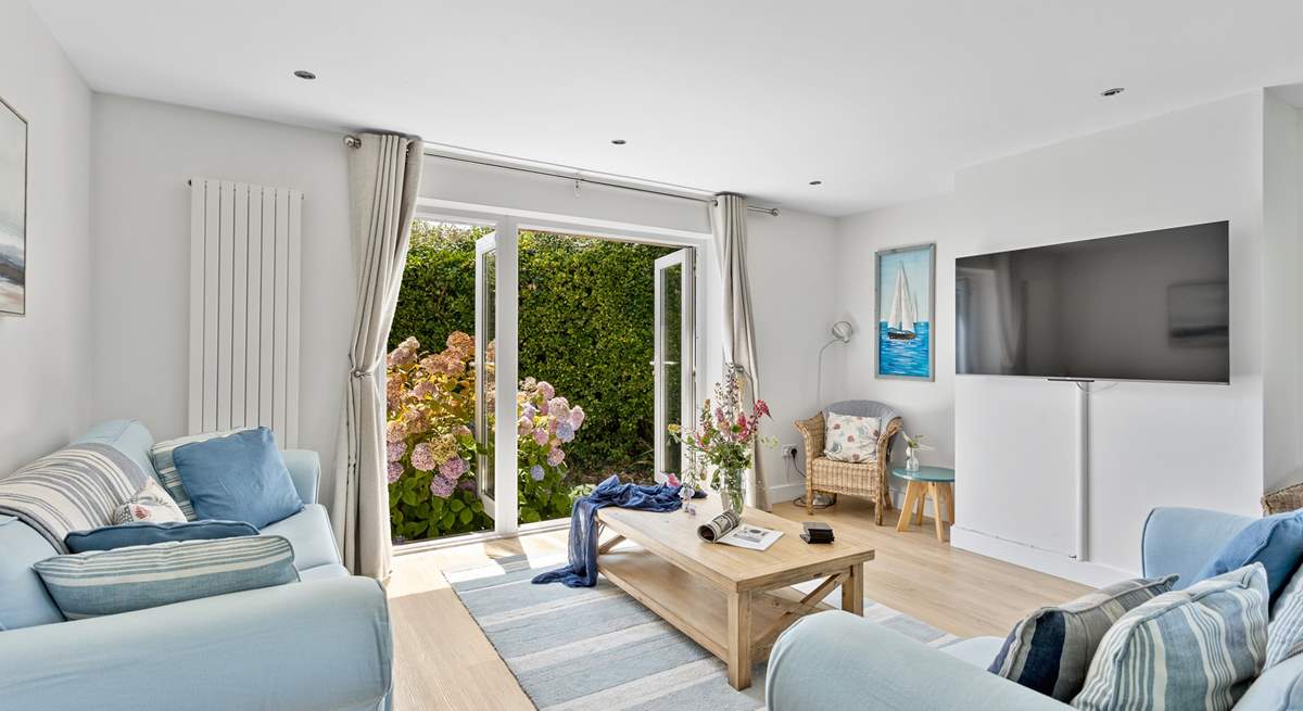 Sit on the comfy sofas and catch a movie on the Smart TV.
