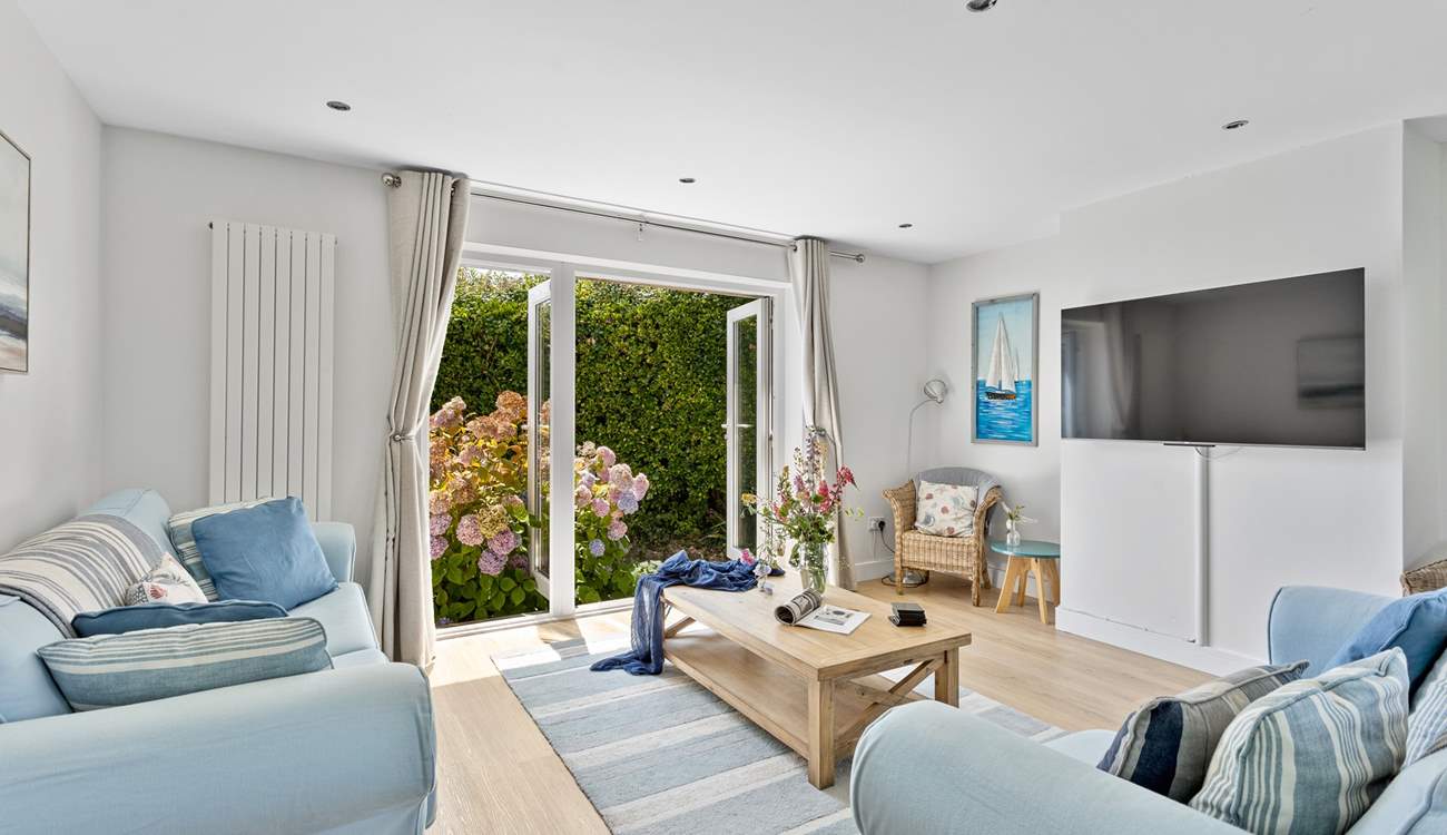 Sit on the comfy sofas and catch a movie on the Smart TV.