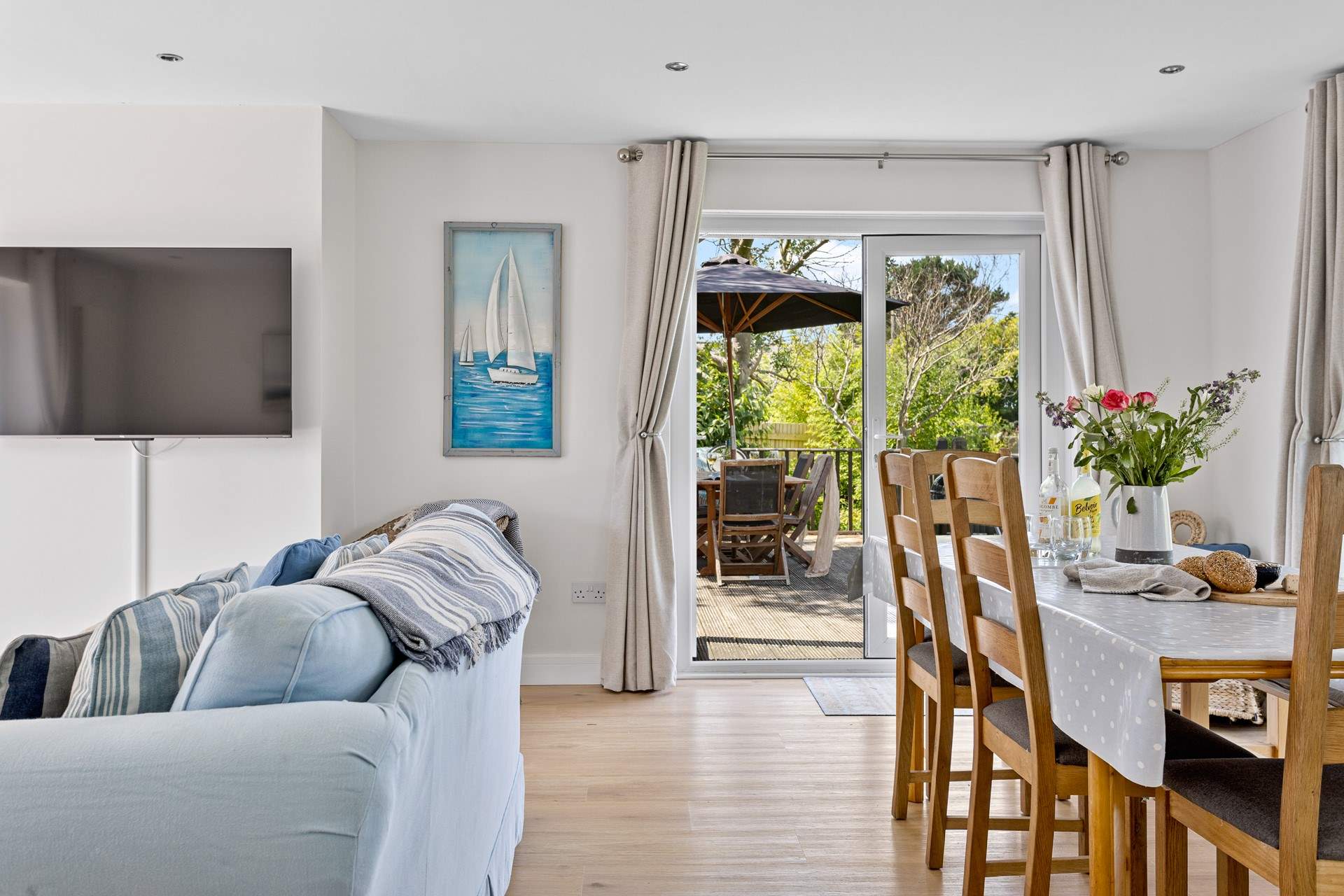 Step outside into the garden through the French windows.