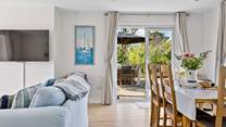 Step outside into the garden through the French windows.