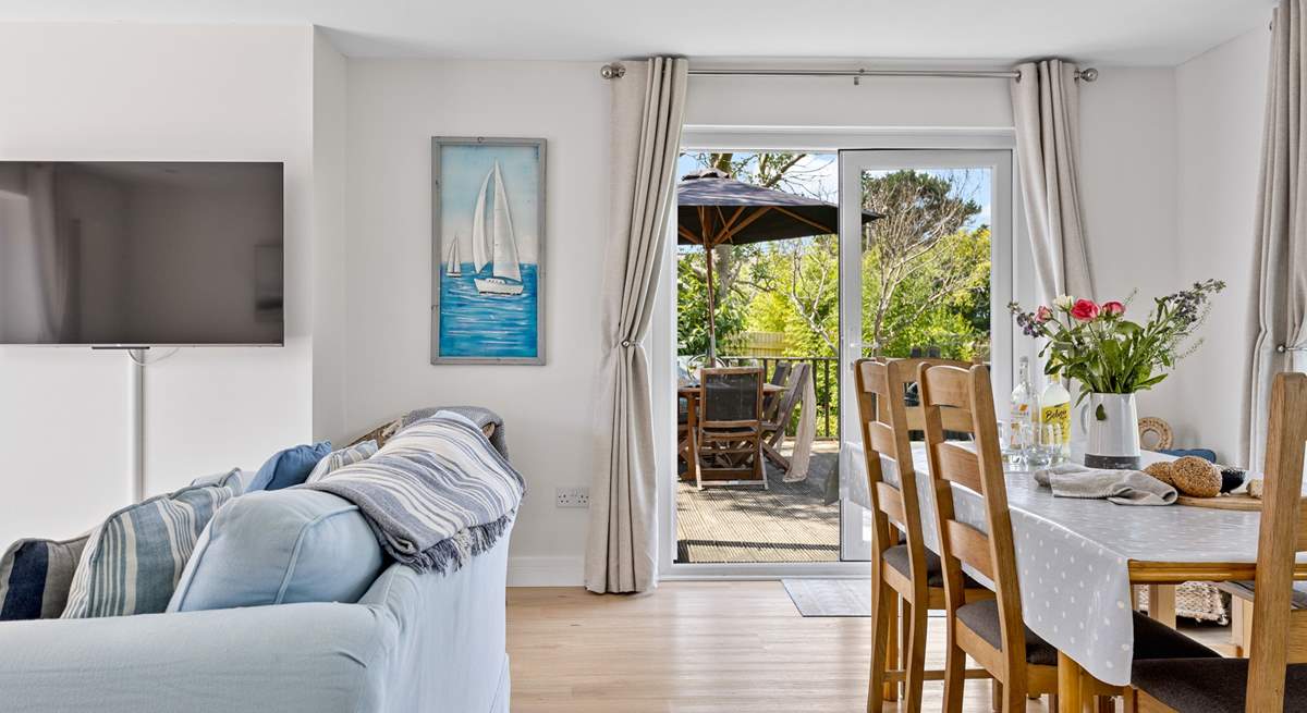 Step outside into the garden through the French windows.