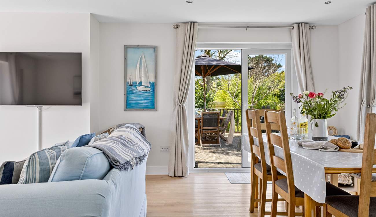 Step outside into the garden through the French windows.