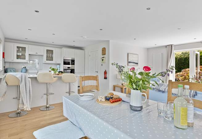 Gather everyone around the table and chat about the adventures of the day. 