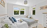 This bedroom has dual-aspect windows which look out into the garden.  - Thumbnail Image