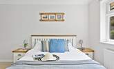 Bedroom 2 is another double room with a king-size bed. - Thumbnail Image