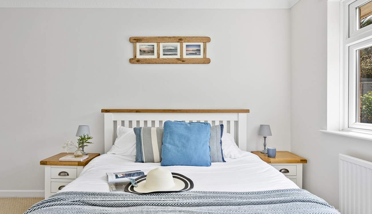 Bedroom 2 is another double room with a king-size bed.