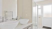The stylish family shower-room. 