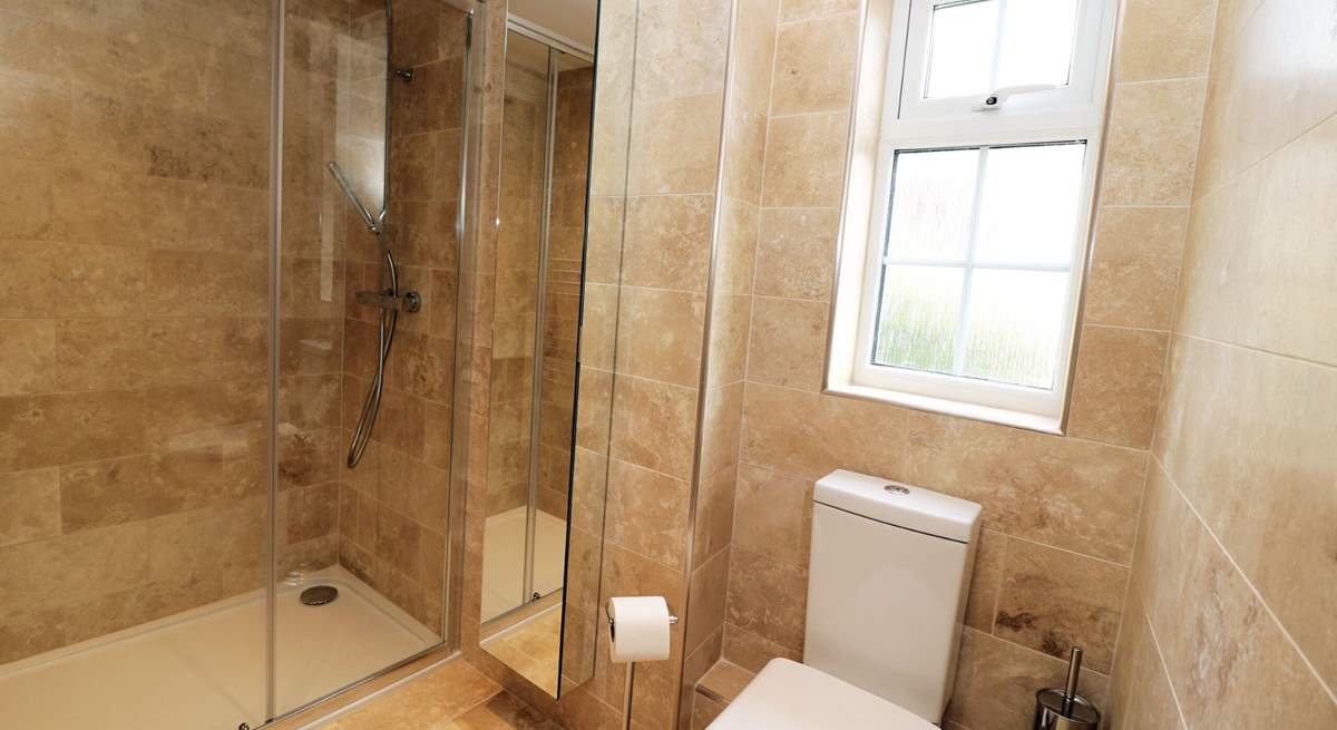 The principal bedroom has an en suite shower-room. 