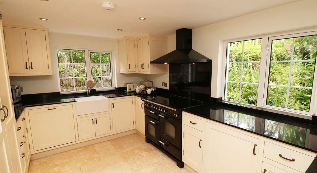 The separate kitchen has all the equipment you'll need on holiday. 