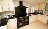 The kitchen has a Range cooker to help feed the family.  - Thumbnail Image