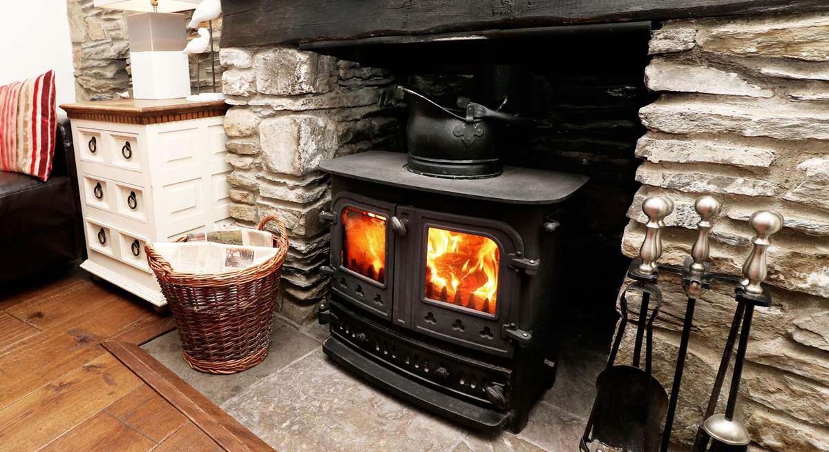 Warm your toes by the wood-burner. 