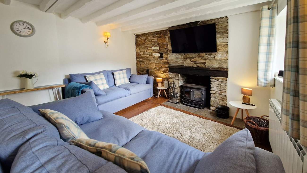 The cosy sitting-room has a wood-burner to keep you warm throughout the seasons.