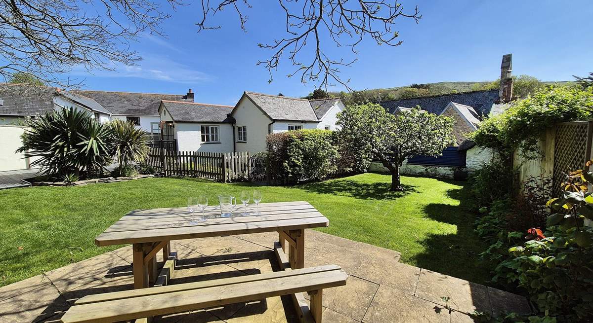 The pretty garden is perfect for al fresco dining. 