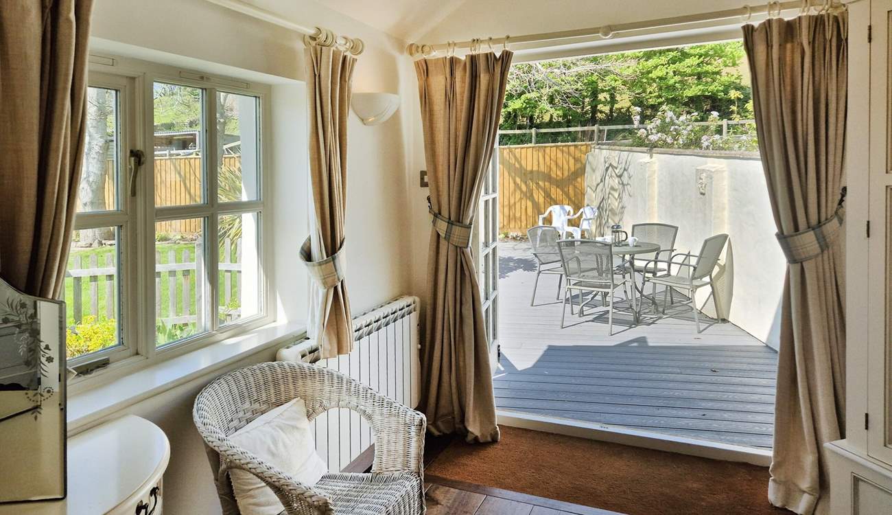 Fling open the French doors in bedroom 1 and step out on to the decked terrace.