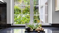 Prepare dinner whilst looking out at the garden.