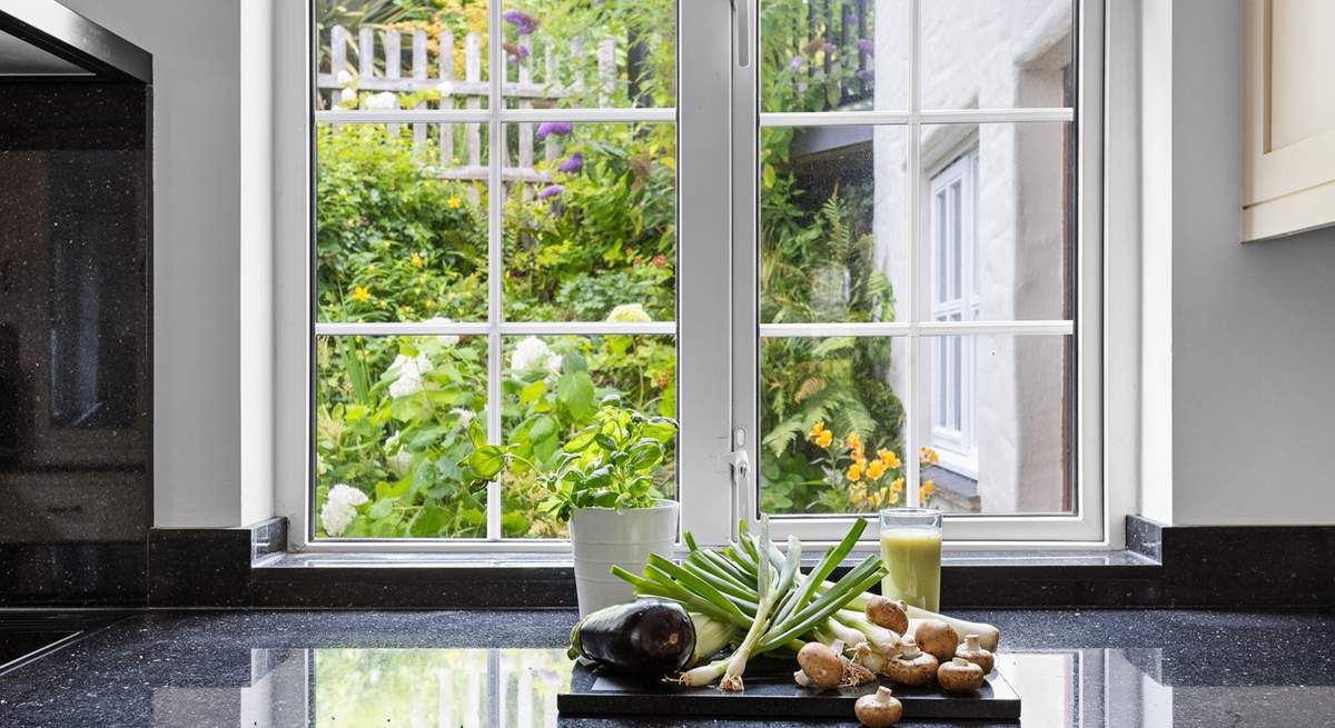Prepare dinner whilst looking out at the garden.