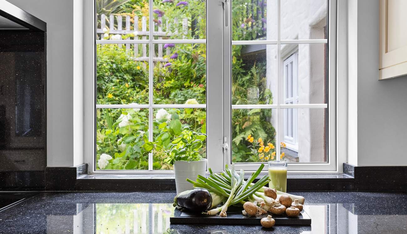 Prepare dinner whilst looking out at the garden.