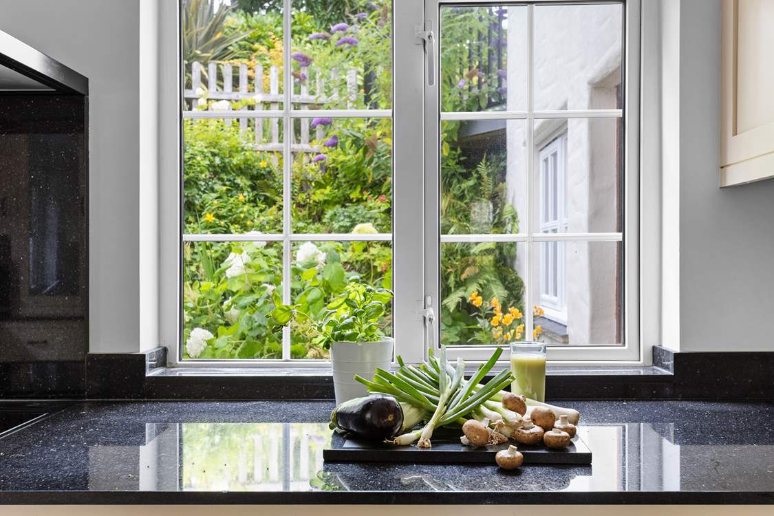 Prepare dinner whilst looking out at the garden.