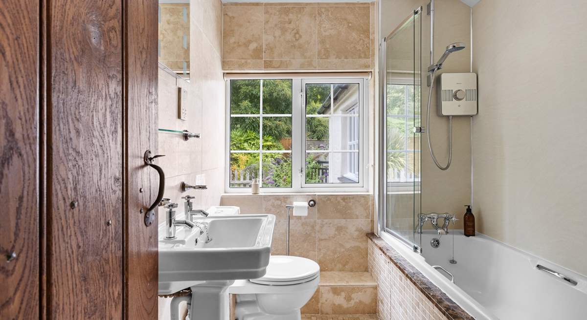 Rinse off those sandy toes in the family bathroom or unwind in a relaxing bubble bath after a busy day.