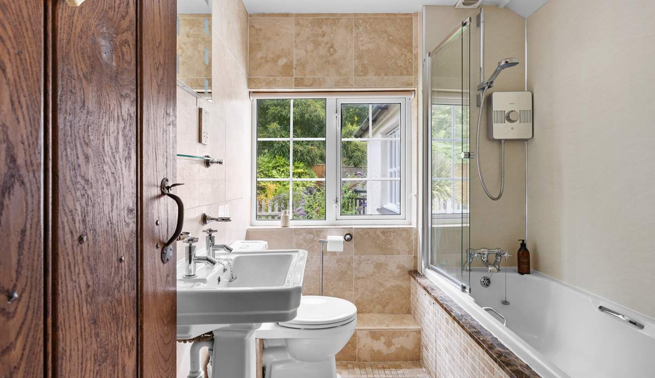 Rinse off those sandy toes in the family bathroom or unwind in a relaxing bubble bath after a busy day.
