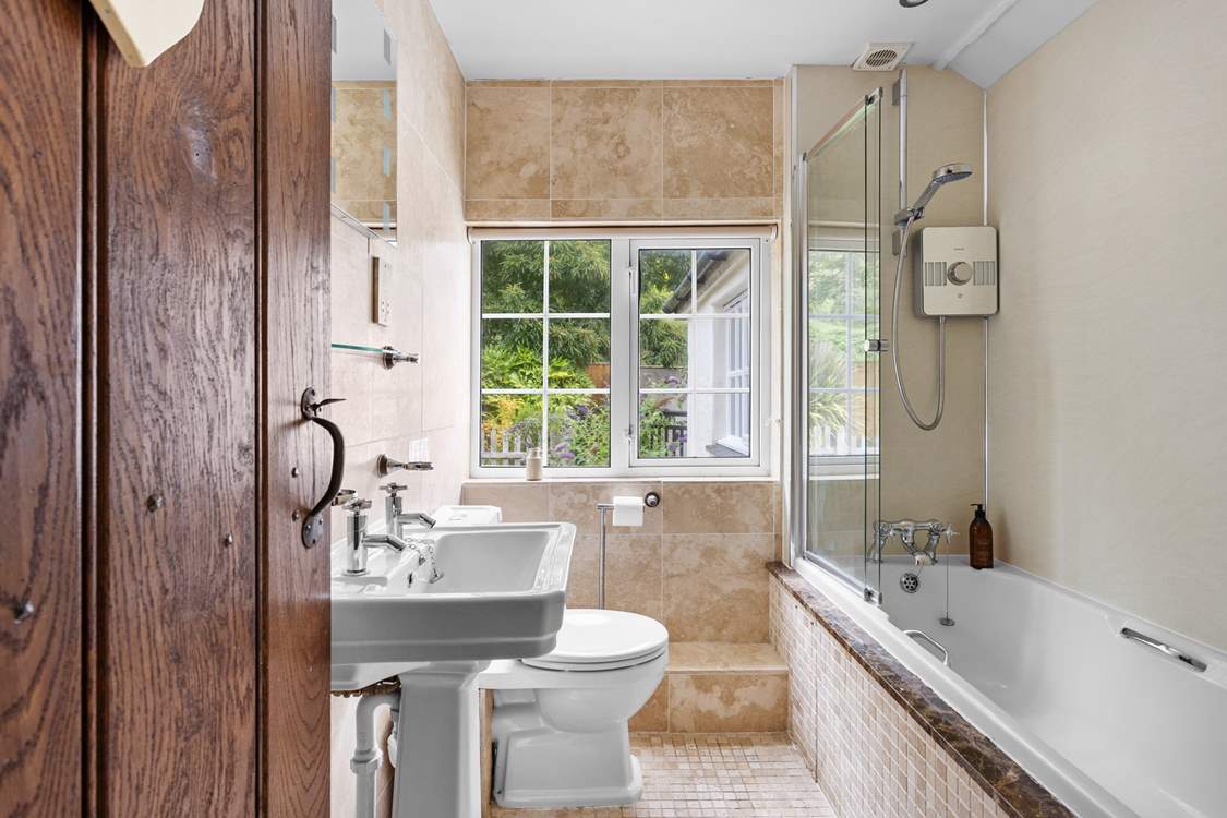 Rinse off those sandy toes in the family bathroom or unwind in a relaxing bubble bath after a busy day.