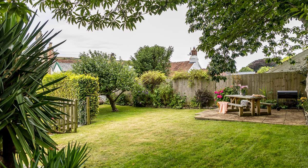 The pretty garden is perfect for al fresco dining.