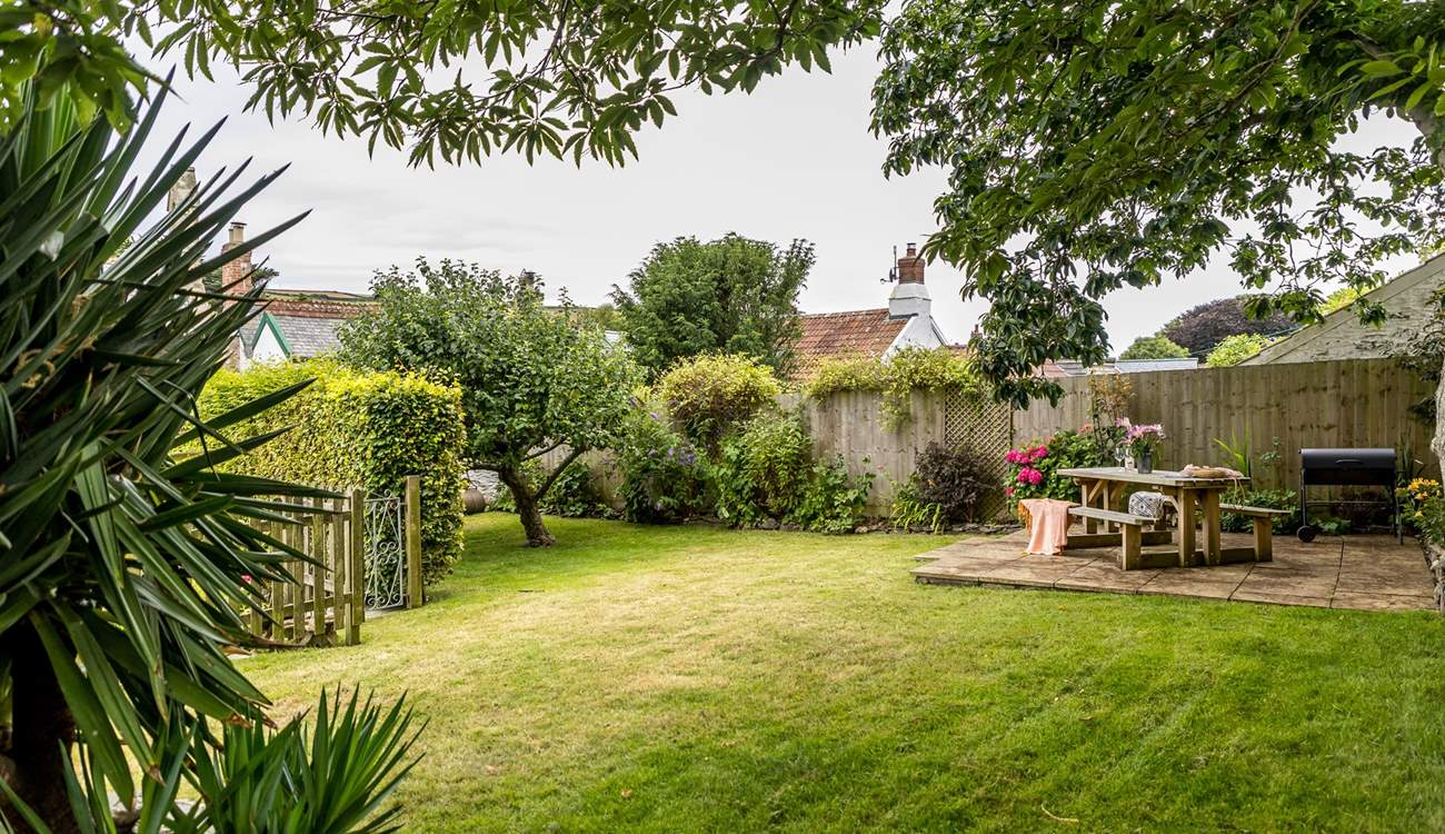 The pretty garden is perfect for al fresco dining.