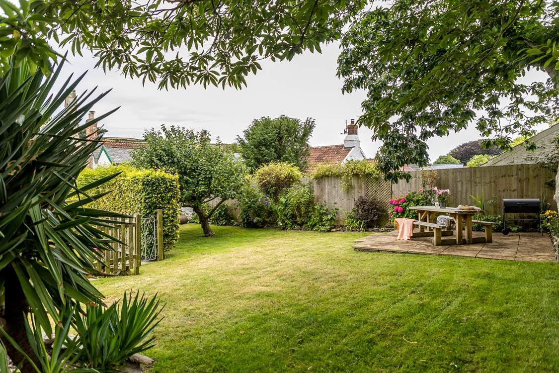 The pretty garden is perfect for al fresco dining.