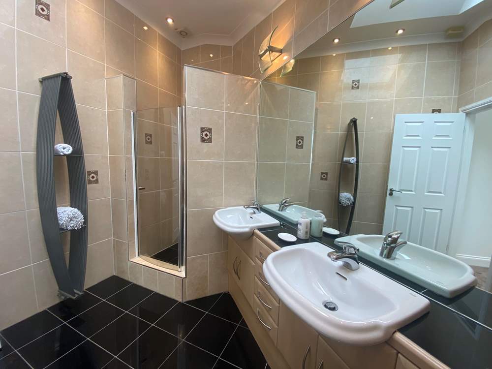 The en suite shower-room to bedroom 1.