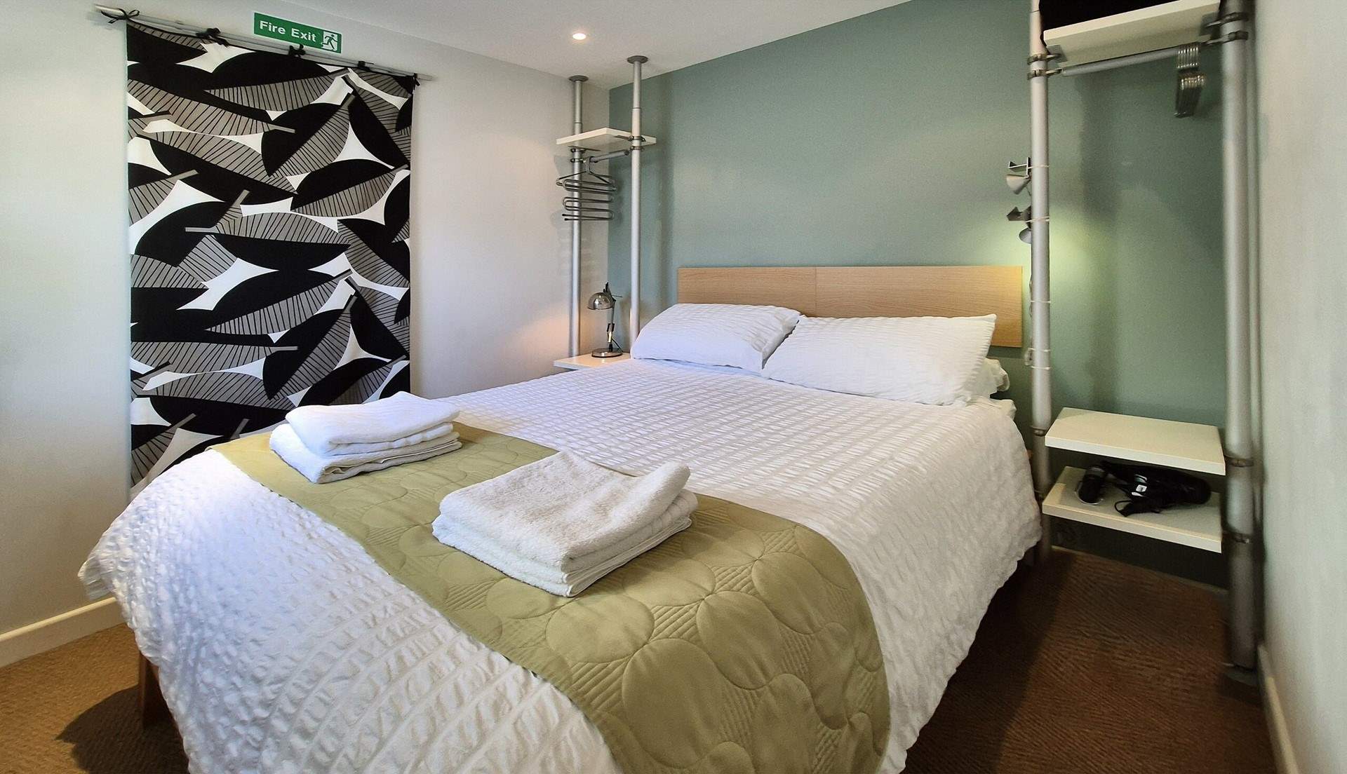 The bedroom has a king-size bed for a restful night's sleep. 