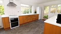 The windows let in the natural daylight. 
