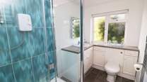 The ground floor shower-room is ideal for rinsing salty toes after a day on the beach. 