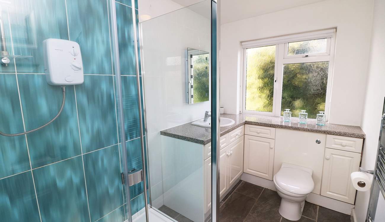 The ground floor shower-room is ideal for rinsing salty toes after a day on the beach. 