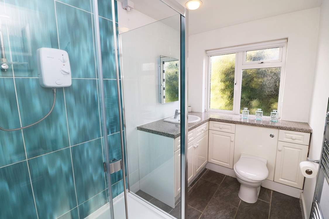 The ground floor shower-room is ideal for rinsing salty toes after a day on the beach.