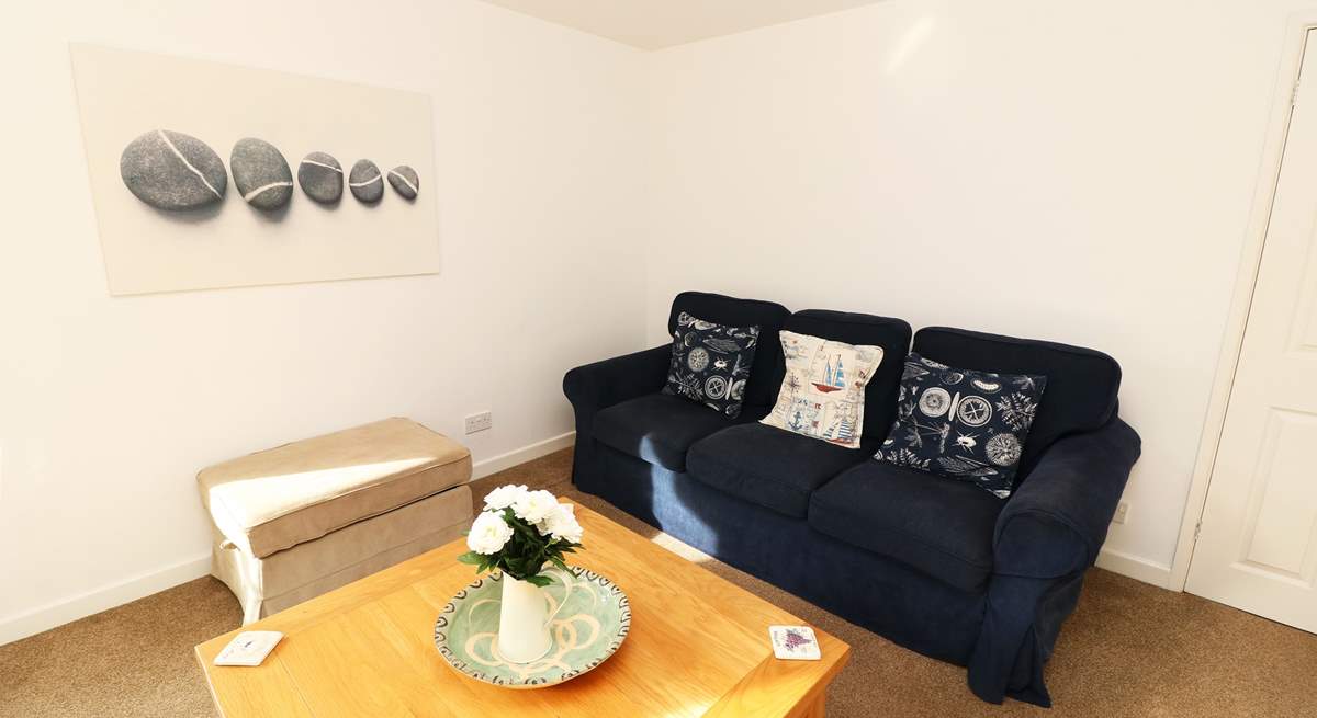 Relax in the sitting-room after a busy beach day.