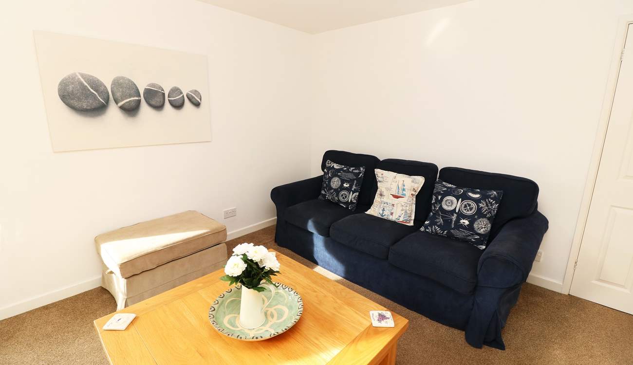 Relax in the sitting-room after a busy beach day.