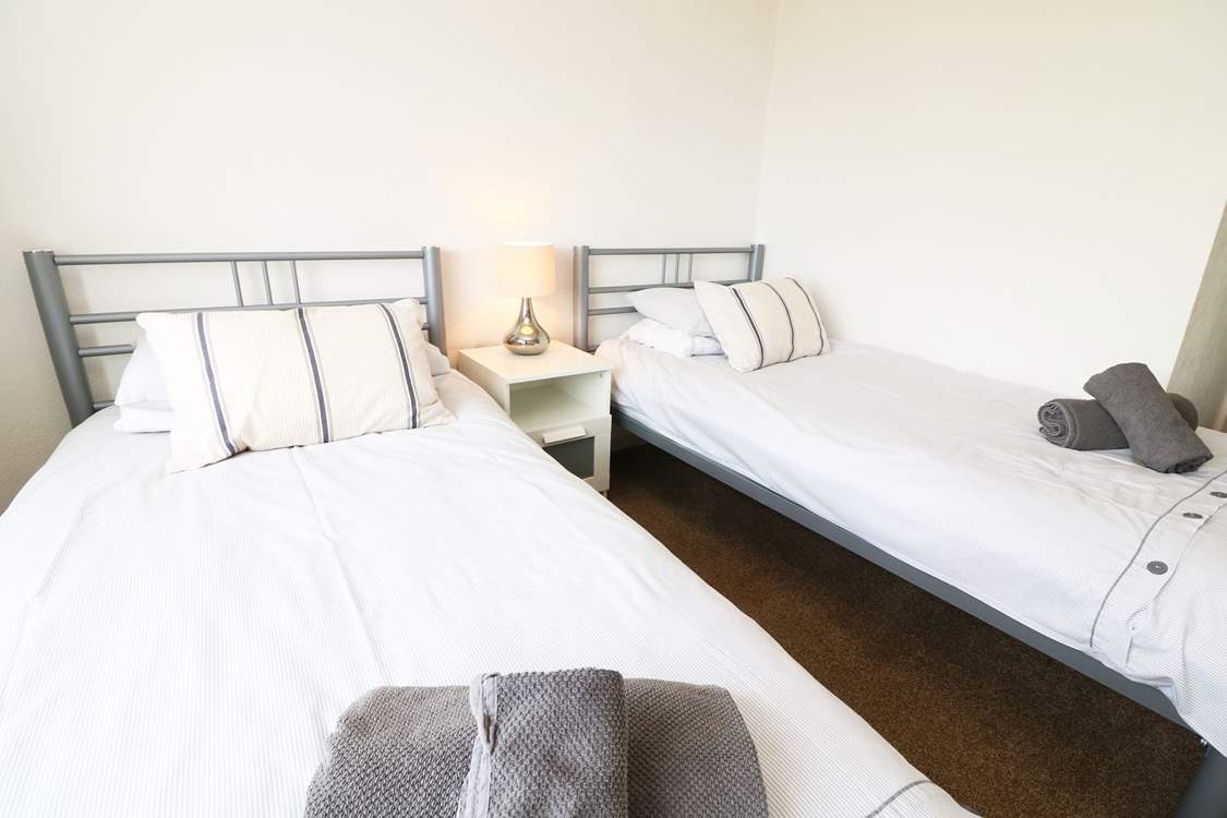 The twin bedroom is ideal for either adults or children.