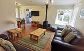 The open plan living space is cosy and welcoming.  - Thumbnail Image