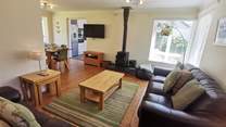 The open plan living space is cosy and welcoming. 