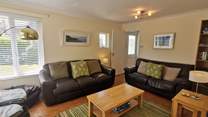Cosy up in the sitting-area after a busy beach day. 