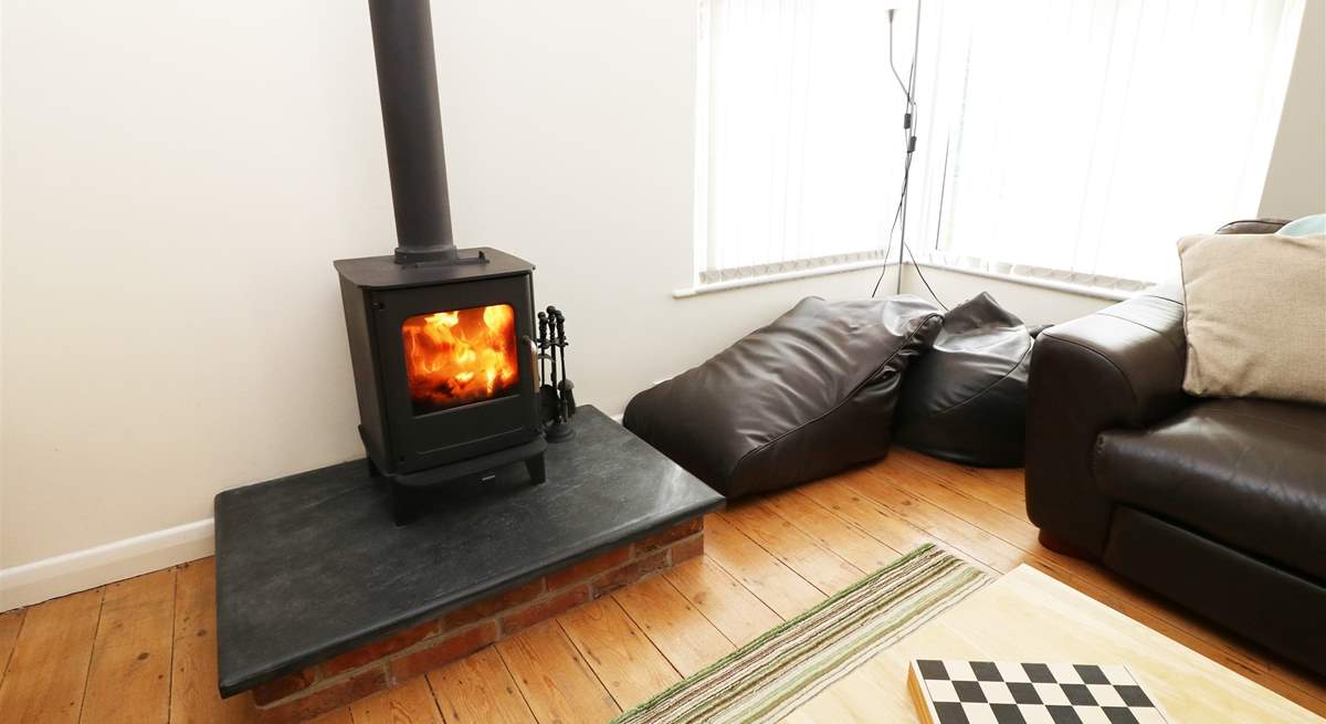 The wood-burner will keep you cosy whatever the weather. 